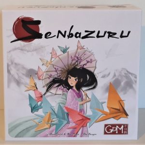 Boîte du jeu de société Senbazuru avec une femme japonsaise et des grues en origami